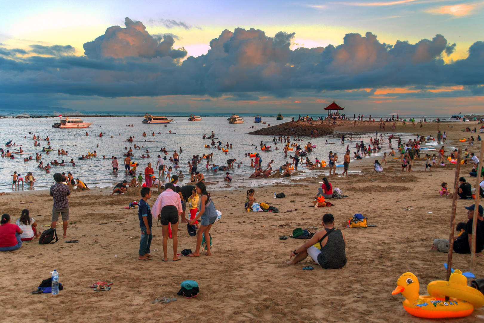 Balinese day trippers on the Sanur beach