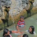 Balinese family in hot springs