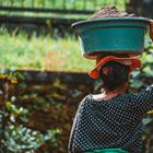 Balinese woman working as bricklayer