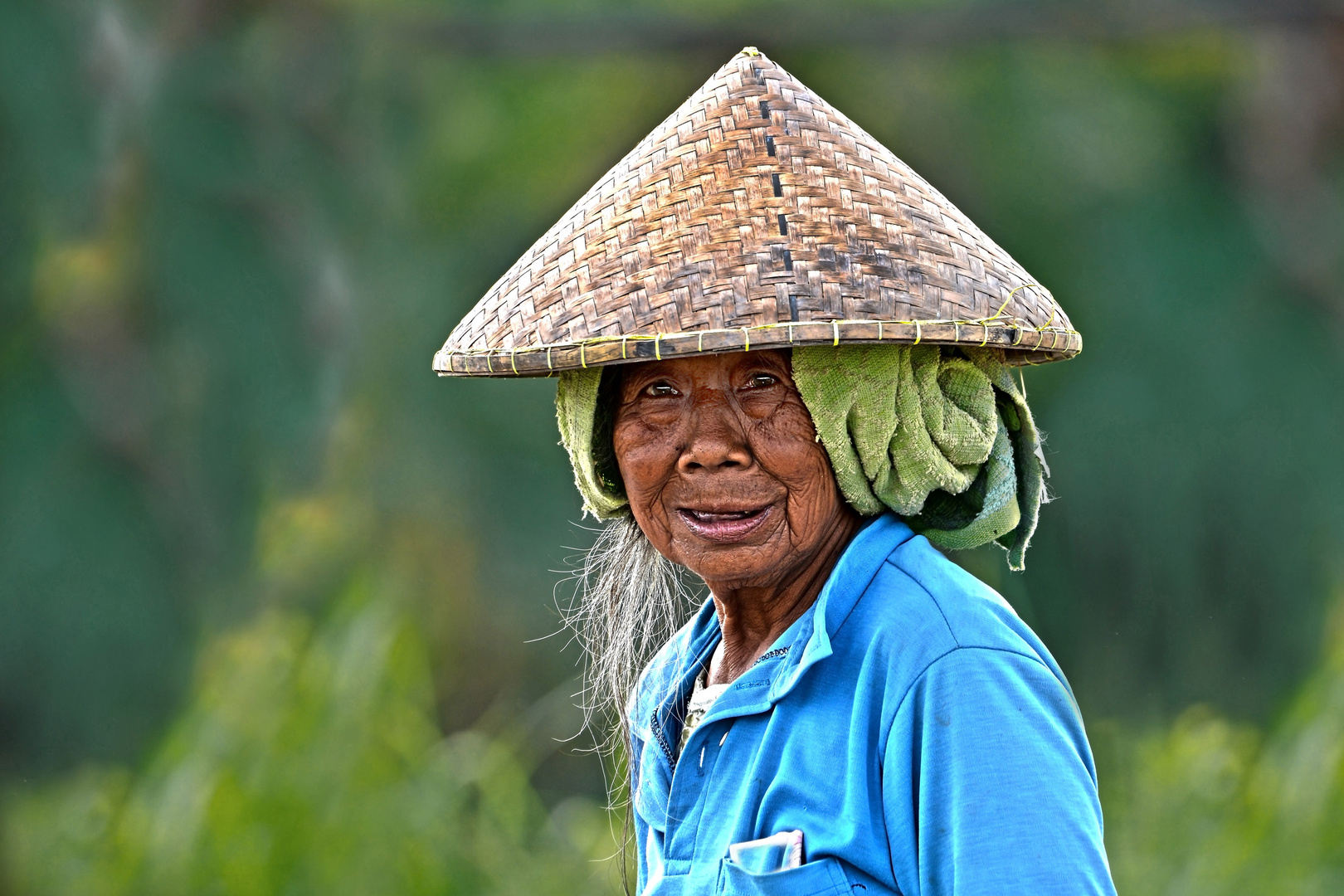 Balinesische Reisarbeiterin