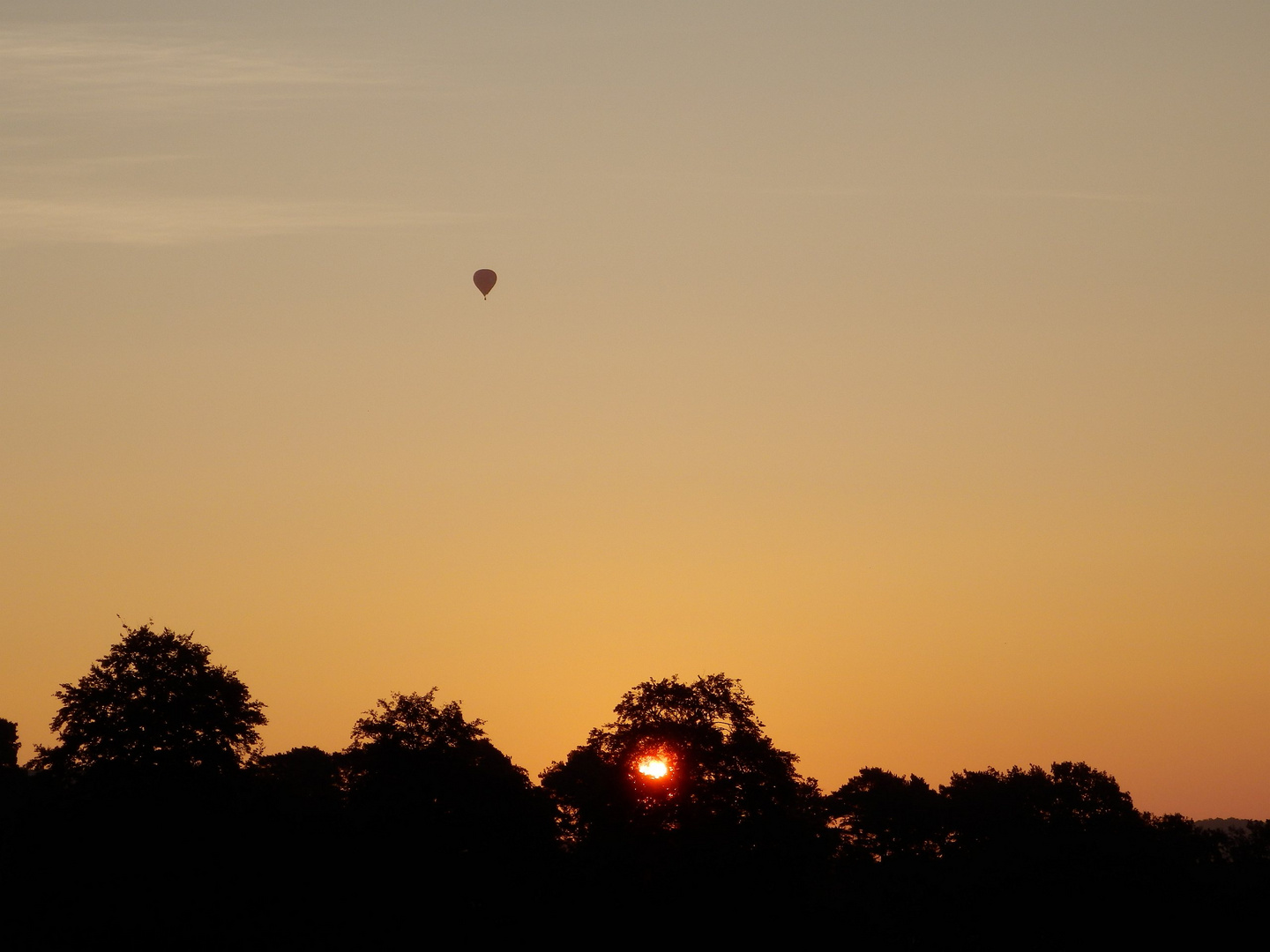 Ballon im Sonnenaufgang