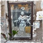 Banksy behind Glas