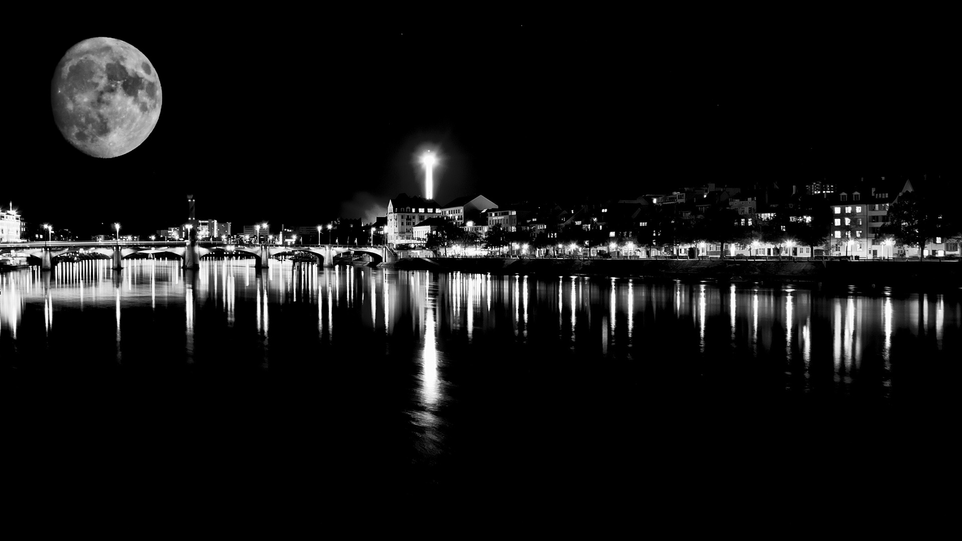 Basel bei Nacht mit Mond