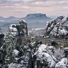 Basteibrücke in der Sächsischen Schweiz im Schneegewand