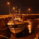 Bateau dans un port lors d'une soirée d'été