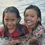 Bathing at the beach in Amed