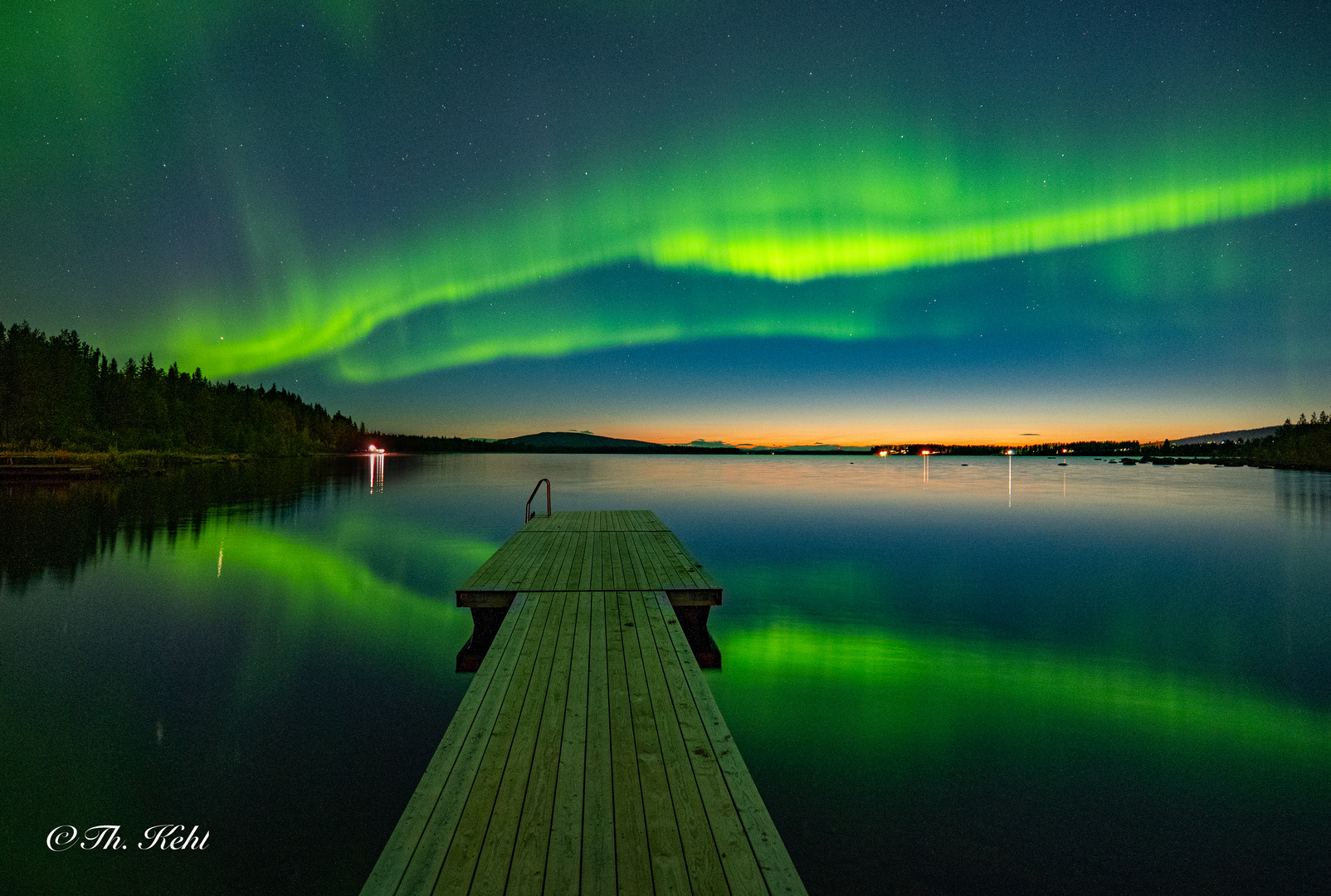 bathing under northern lights Lapland / Sweden