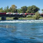 Baureihe 185 mit einem "Mischer" auf der Isarbrücke