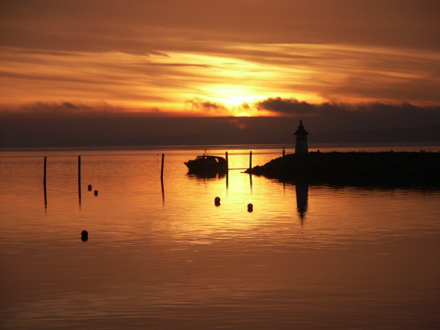 Båd i solnedgang