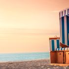 Beach chair and beach at sunset on Sylt. Summer vacation context