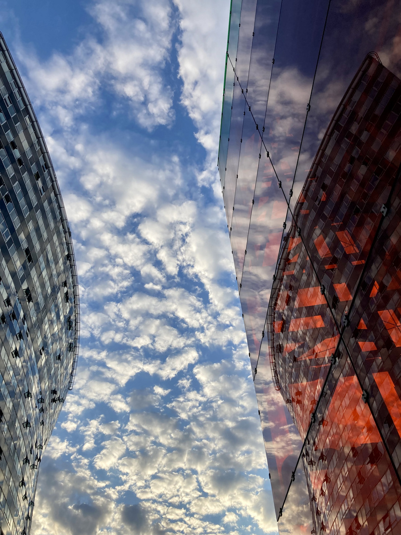 Beautiful clouds between the buildings 