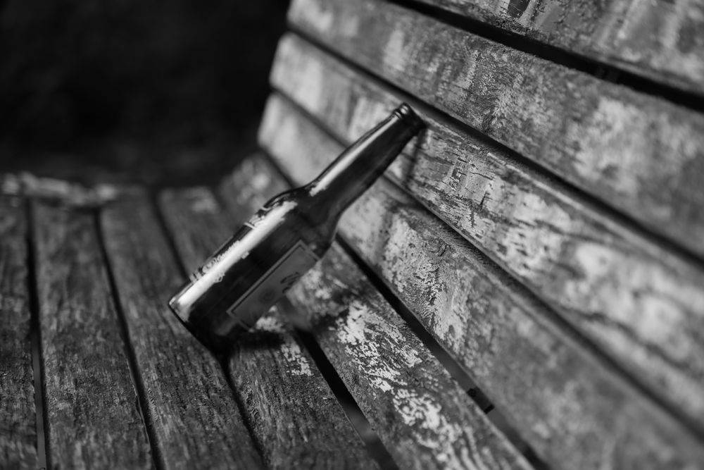 Beer bottle on bench