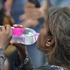 Beggar Girl drinking