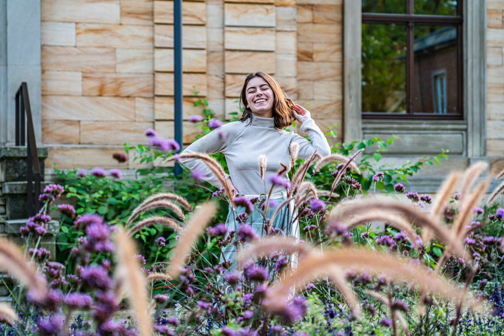 Behind the blooming flowers