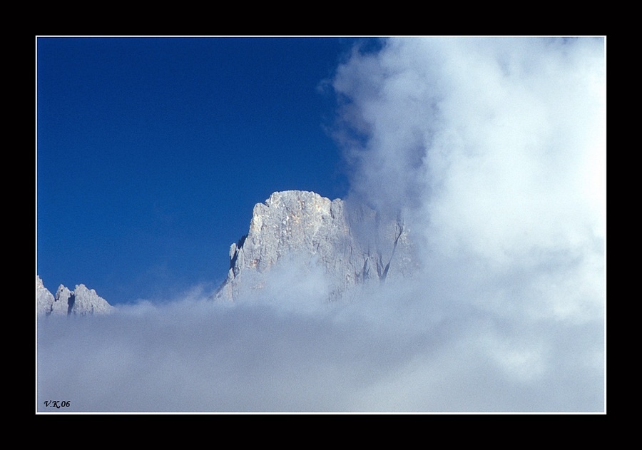 Behind the clouds