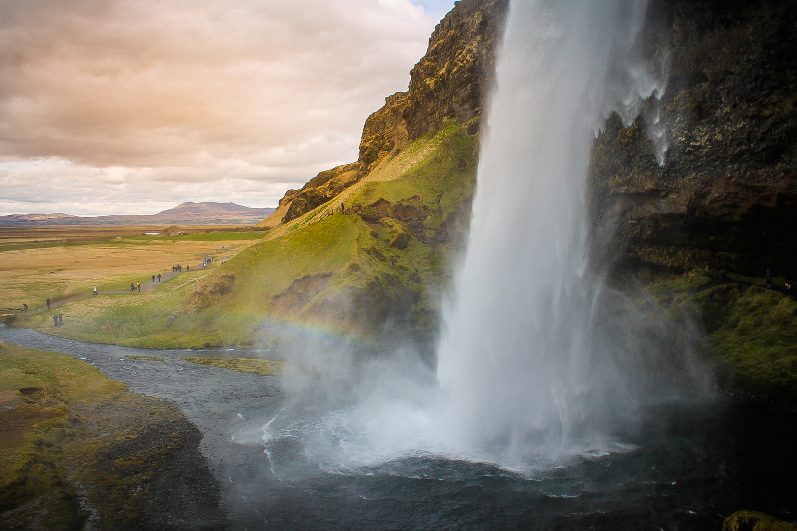 Behind the waterfall