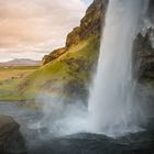 Behind the waterfall