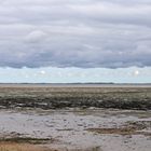 Bei wolkenverhangenem Himmel auf der Wattseite von Amrum