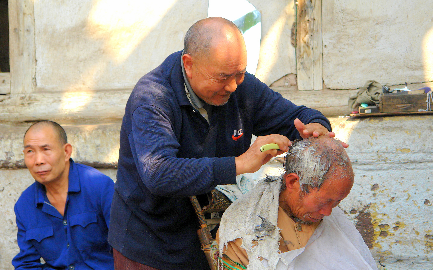 Beim Dorffriseur in Sechuan