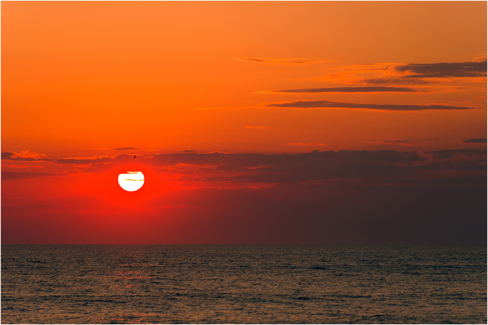 Beim Sonnenuntergang am Strand