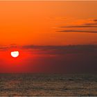 Beim Sonnenuntergang am Strand