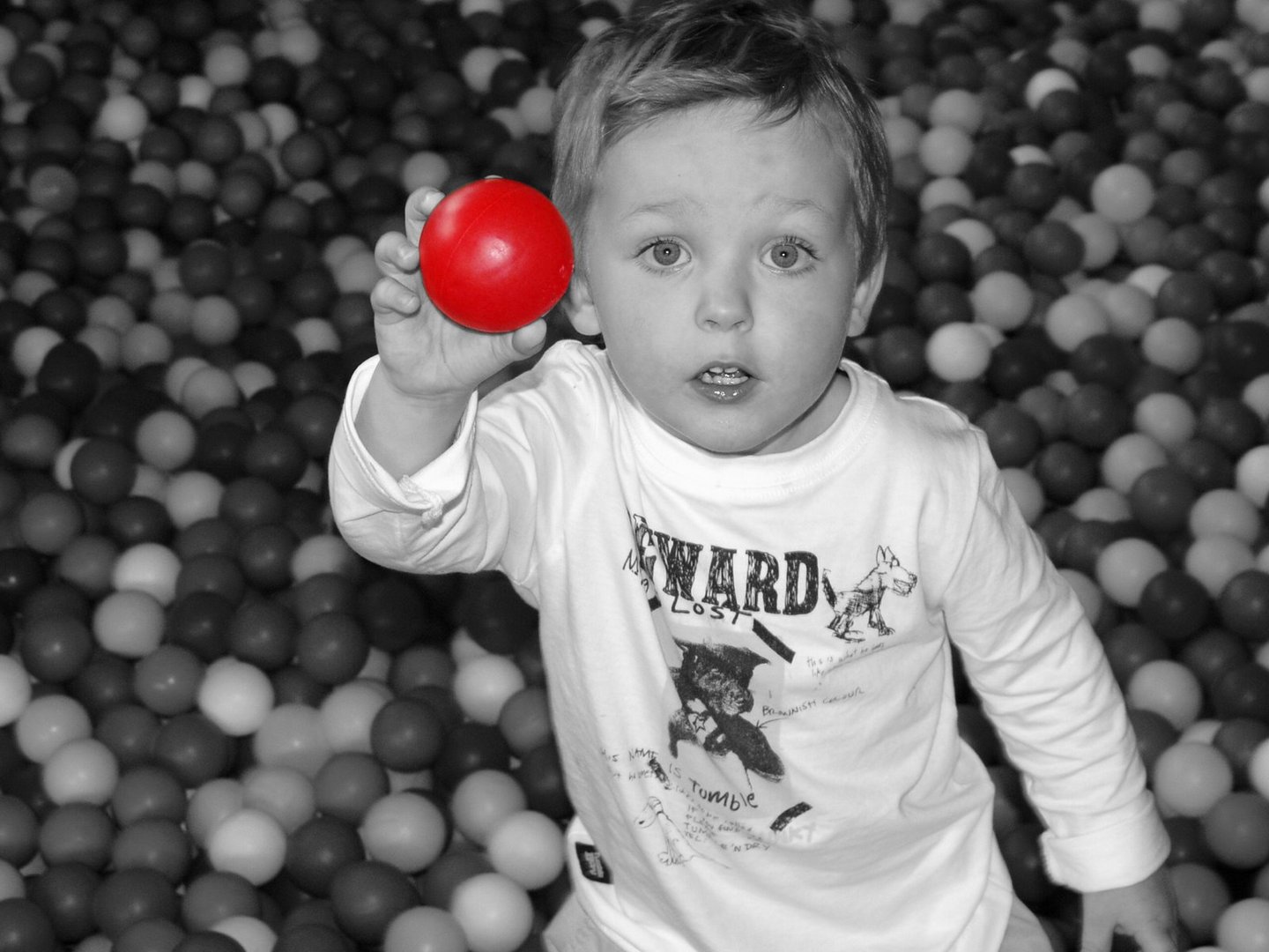 Ben at play house with red ball