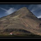 Berg gegen Haus