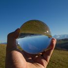 Bernese Alps in glass sphere