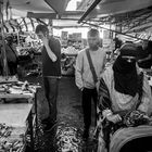 Between light and shadow, in the old market