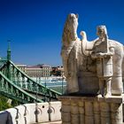 between the sculpture, history, Buda, and Pest