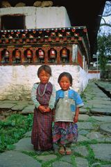 Bhutanese little ladies in the yard of the Kyichu Lhakhang monastery