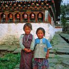 Bhutanese little ladies in the yard of the Kyichu Lhakhang monastery