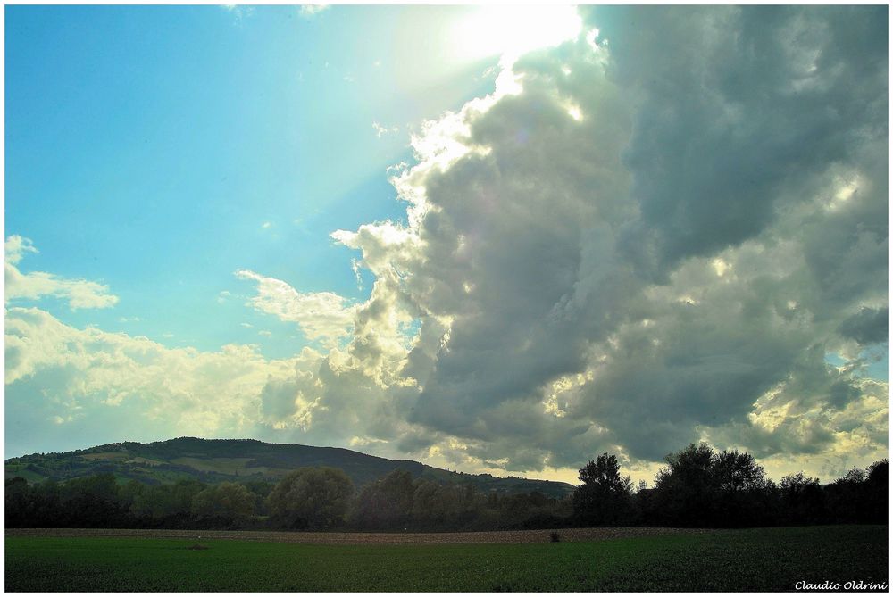 Big clouds on the hills