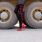 Big wheels behind red Heels