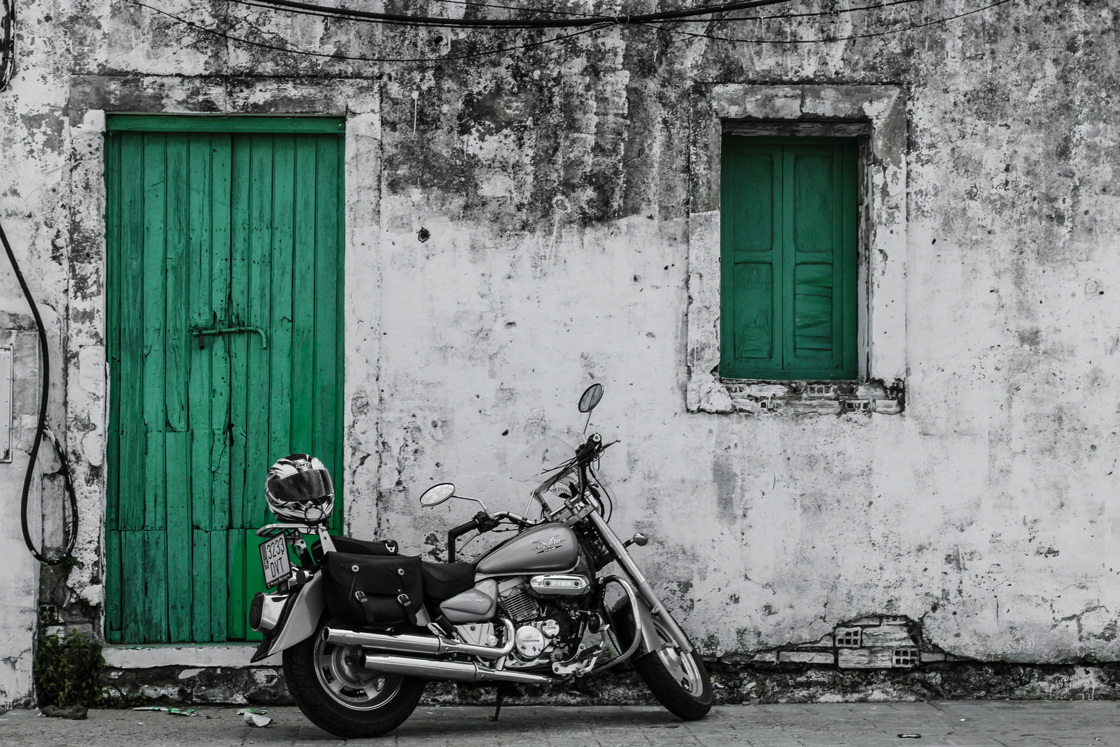 Bike in front of green door