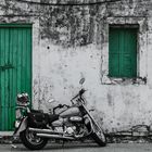 Bike in front of green door