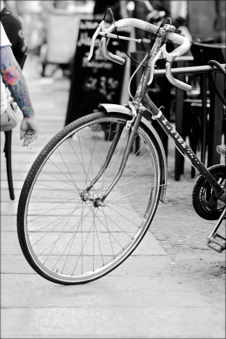 bike tattoo and cigarette