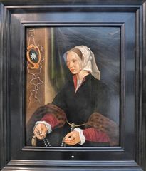 Bildnis einer Frau, einen Rosenkranz haltend 