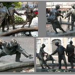 Bizarre Skulpturen an einem Aachener Brunnen