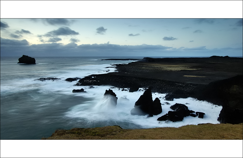 [ ... black beach ]