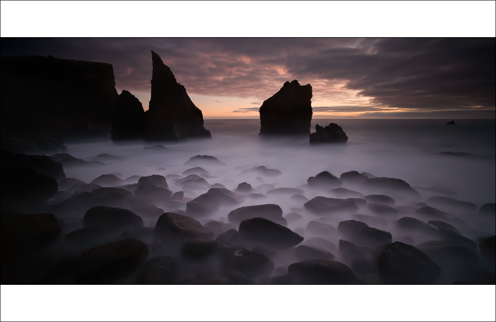 [ ... black beach ]