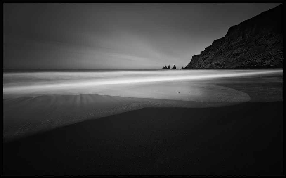 [ ... black beach ]