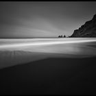 [ ... black beach ]