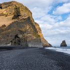 Black Beach with a Lonely Man ...! 