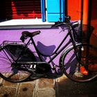 Black Bicycle on Colorful Wall