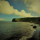 Black lava sand beach