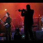 black man playing the trumpet