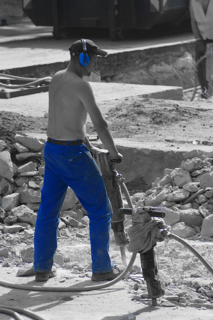 Blauer Bauarbeiter