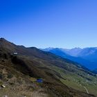Blick auf die Rastkogelhütte; im Hintergrund der Alpenhauptkamm