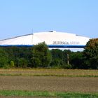 Blick auf die Veltins Arena vom neuen Friedhof aus